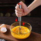 Stainless steel push & rotate egg whisk